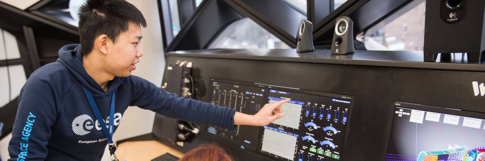 Aerospace students in flight simulation lab