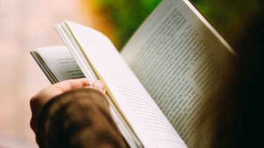 Student reading a book