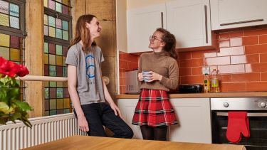 St George kitchen - two students socialising