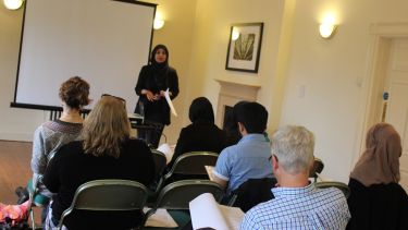 A speaker giving a talk.