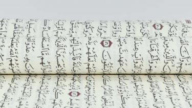 Arabic script written on paper
