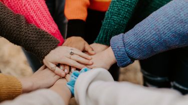 A circle of hands
