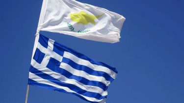 Greek flag in blue sky