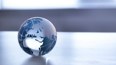 A transparent globe on a table