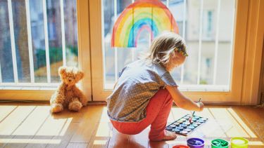 Child and teddy bear