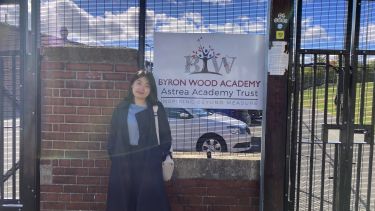 Teacher Li Qian outside Byron Wood Academy