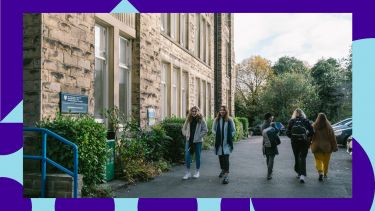 Students walking outside of the Elmfield Building