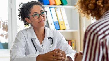GP talking to patient