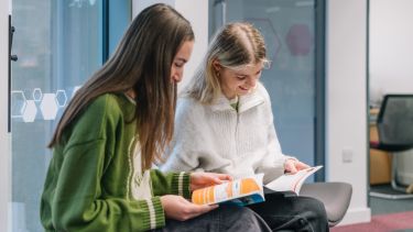 Image of two students reading in the Employability Hub
