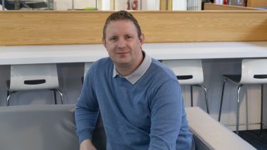 David Yates wearing a blue jumper.