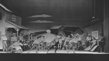 original cast of Oklahoma on stage in western costume