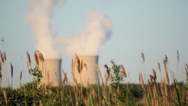 Large industrial chimneys.