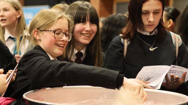 girls making candyfloss at STEM for girls