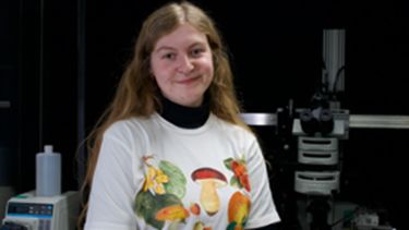 sarah hool in front of equipment