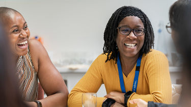 A woman smiling