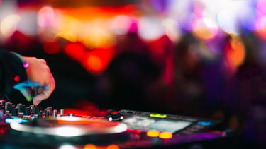 Blurred image of hands DJing