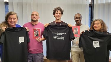 The Off the Shelf team modelling the new festival T-Shirts