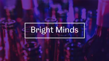 The Bright Minds logo in front of some beer bottles