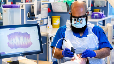 Prosthodontics student working on a simulated patient