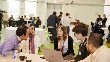 People sharing ideas at a the Hub's Innovation Pipeline 