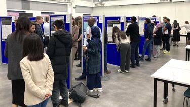 People looking at poster presentations
