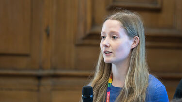 Image of student with microphone 