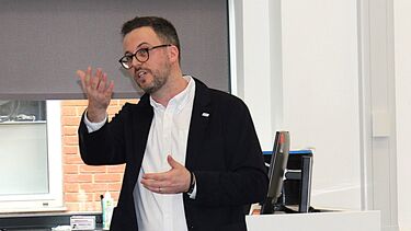 Andrew Ratcliffe giving a talk to students