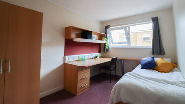 A single bedroom in Shore Court