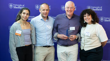 Owen Whitfield with his Alumni Volunteer of the Year 2025 award, alongside representatives from the School of Chemical, Materials and Biological Engineering