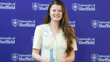 Megan Yeo with her award for Highly Commended Alumni Volunteer 2025