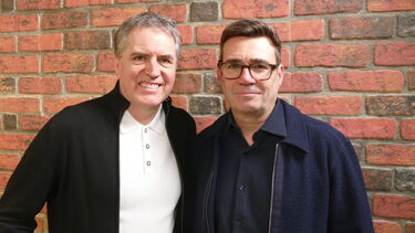 Andy Burnham and Steve Rotheram stood in front of a brick wall