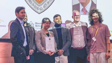 Researcher pose for a prize award ceremony photo