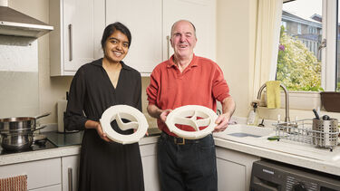 Frank with student Stenee showing off the plating aids