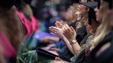 grads in hall