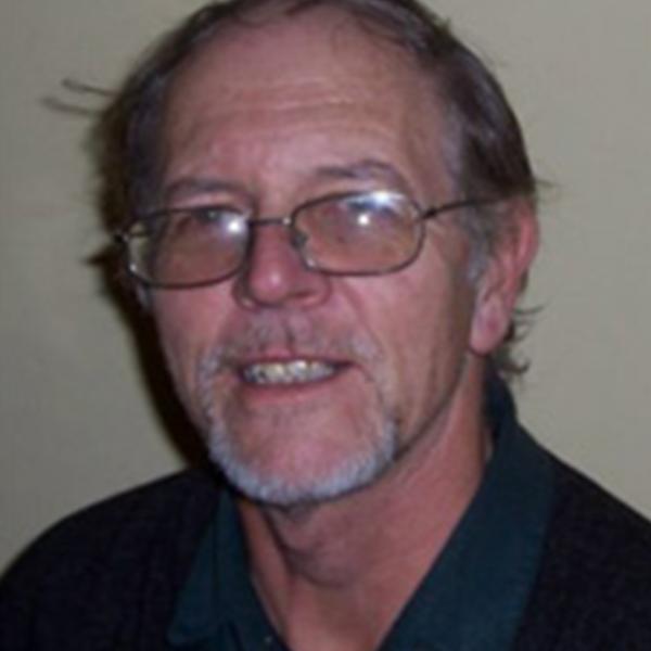 Profile picture of A portrait shot of retired lecturer George Botterill.