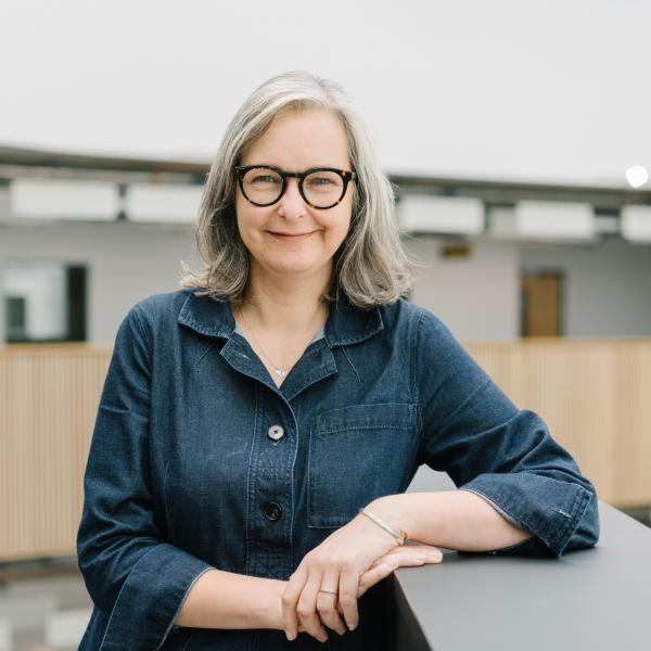 Profile picture of Image of Kerry Swain, SMI Learning and Teaching Manager stood in the Wave Atrium