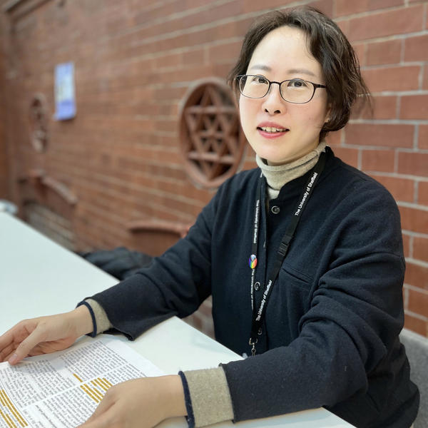 Profile picture of Academic Gigi Choi sat at table