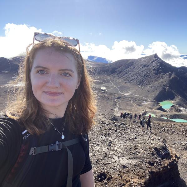 Profile picture of Rebecca England on a mountain trail