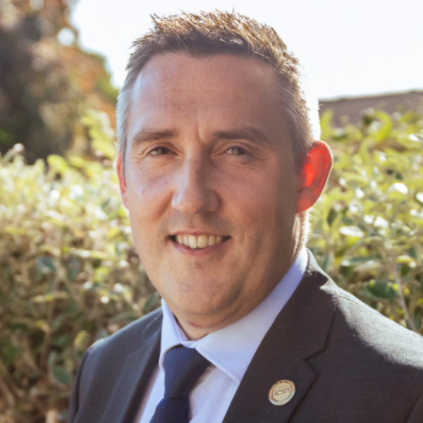 Profile picture of Man wearing suit and tie