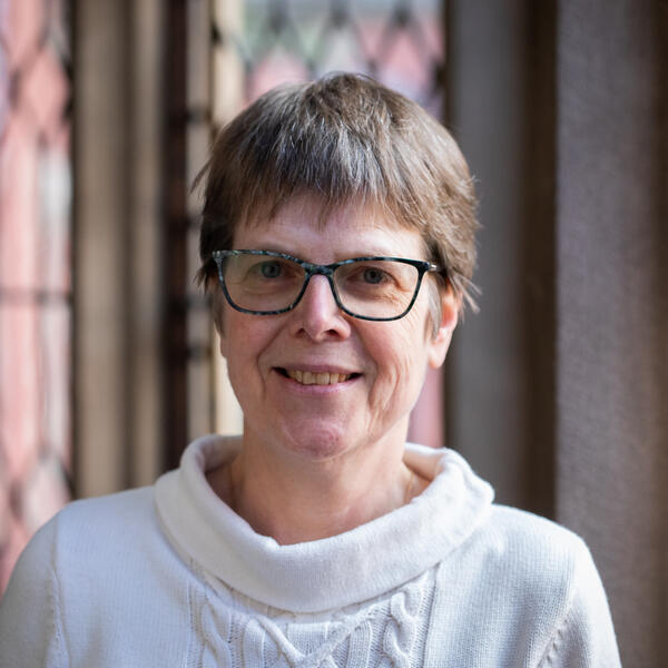 Profile picture of Portrait of a person wearing glasses and smiling