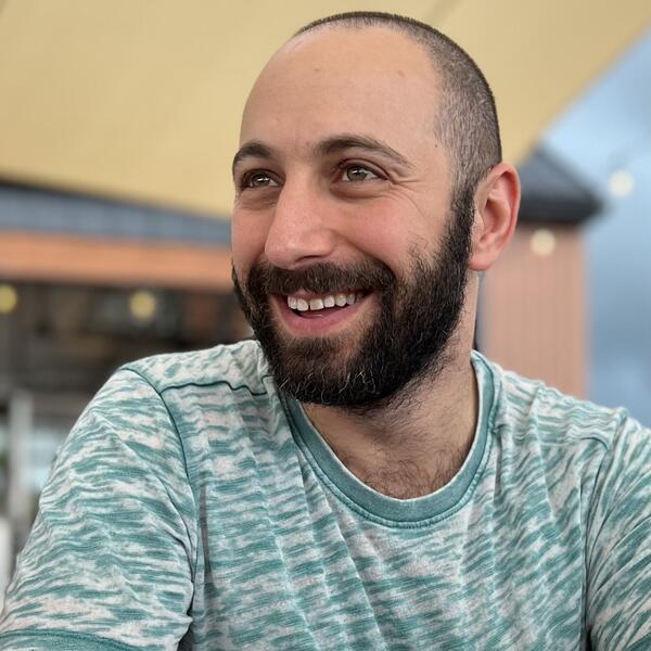Profile picture of Image of Dr Ariel Frame, a bearded man wearing a blue camouflage shirt