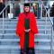 A photo of Yanti in her graduation gown and cap.