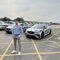 Student stood in front of cars ar JLR