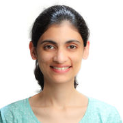 A headshot of Aishwarya Bhuta against a white background