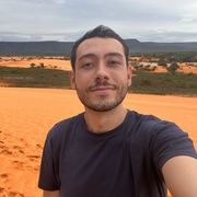 A selfie of Davi Cerqueira Pereira de Lemos in a sandy area