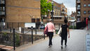 women walking outside by the canal