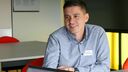 A photo of AMRC Training Centre apprentice Ian Pengkerego, Ian is seated and is looking off camera to the viewer's left.