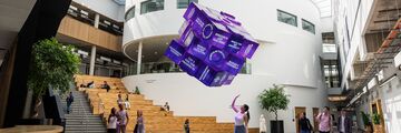 Girl with hovering cube illustrating study at Sheffield