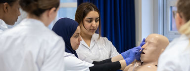 Students practising NG tube insertion