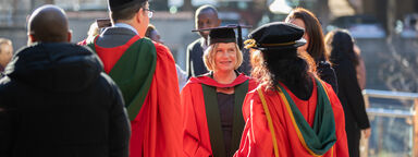 PG research students on concourse at Graduation